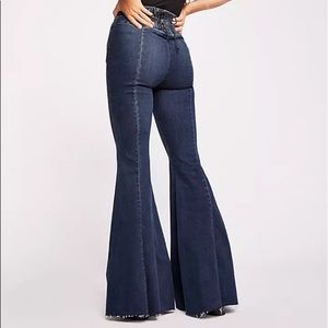We The Free curvy lace back raw hem flare jeans
